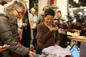 Jussara Lee held a holiday mending party to encourage sustainability.