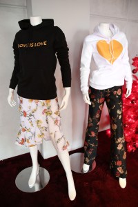 NEW YORK, NY - DECEMBER 14:  A view of atmosphere and Love Is Love sweatshirts on display at the Prabal Gurung & Mastercard event celebrating the Love Is Love Collection at Spring Place on December 14, 2017 in New York City.  (Photo by Monica Schipper/Getty Images for IMG)
