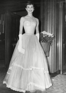 AUDREY HEPBURN attending the Awards Ceremony in 1955.The BRITISH FILM ACADEMY AWARDS in 1955