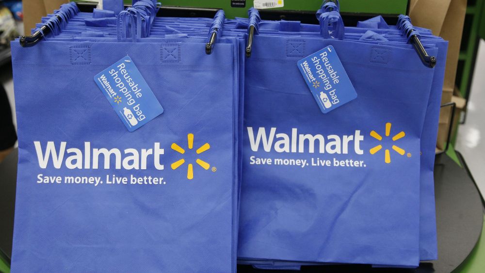Reusable shopping bags are offered for sale at a Wal-Mart Neighborhood Market, in the Chinatown district of Los Angeles. Wal-Mart is sharpening its attack against Amazon. The discounter says it is changing its membership-based free shipping service test to two days from three days and is charging one dollar less for the annual membership fee. Wal-Mart began testing the service in 2015 as a way to counter Amazon's highly successful Prime shippingWal-Mart-Delivery, Los Angeles, USA