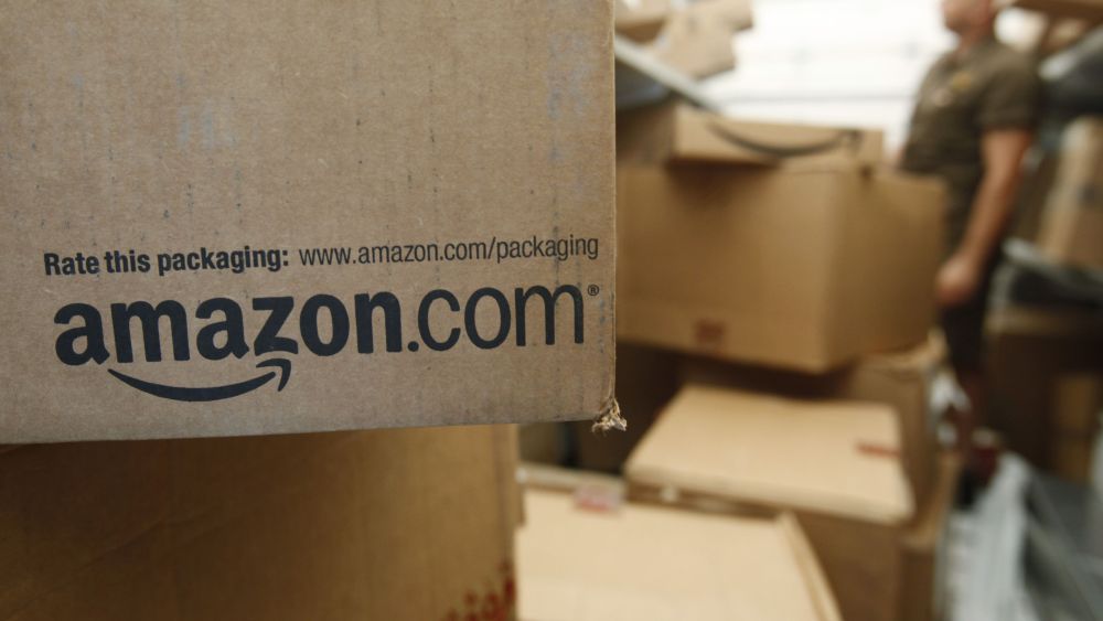 Amazon.com An Amazon.com package sits in a UPS truck in Palo Alto, Calif. As of 2014, the company is the biggest online retailer in the U.S., commanding about 20 percent of all e-commerceSmart Spending Avoiding Amazon, Palo Alto, USA