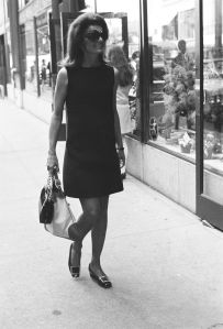 Former first lady and editor for Doubleday, Jacqueline Kennedy Onassis wearing a short simple black dress, sunglasses, and walking in New York City. Photograph was taken on September 18, 1968.
Jacqueline Kennedy Onassis in New York City, September 18, 1968., New York