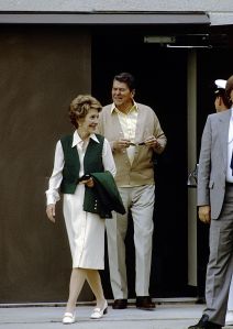 President Ronald Reagan and First Lady Nancy Reagan walk out of the Bethesda Naval Hospital after his annual check-up. The President pauses to put on his sunglasses.Ronald Reagan and Nancy Reagan leave Bethesda Naval Hospital, Washington DC, USA - 17 May 1984