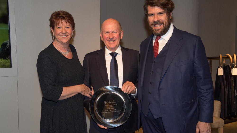 Winners Pamela and Robert Sandlant with Loro Piana ceo Fabio d'Angelantonio