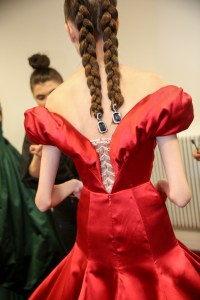 Damien Boissinot wove modelsÕ hair into two braids starting at the top of their heads for the Alexis Mabille couture show. ÒHe wanted big braids inversed,Ó said the hairstylist, who explained the plaits were made using extensions. ÒAnd then weÕre going to mess [them] up a little bit.Ó Boissinot described the look as a bit ÒtribalÓ feeling, but at the same time Òstill chic and very couture.Ó The braidsÕ ends were decorated with costume jewelry clips created by Mabille. ÒHe wanted to put [them] in the hair because itÕs quite raw, quite tough in a way,Ó continued Boissinot, who was working with Ren Furterer products. Ñ Jennifer Weil