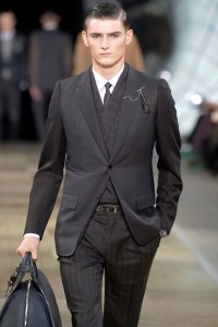 A model on the runway at Louis Vuitton's Fall 2012 menswear show.