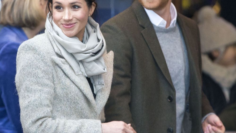 Meghan Markle (in Smythe, Jigsaw and Burberry) and Prince Harry