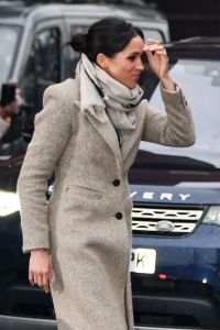 Meghan Markle (in Smythe and Jigsaw) visits Reprezent 107.3FM Radio station in London.