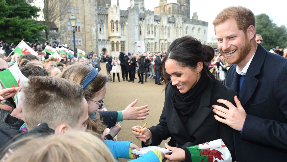 Prince Harry and Meghan Markle (in Stella McCartney) at Cardiff Castle