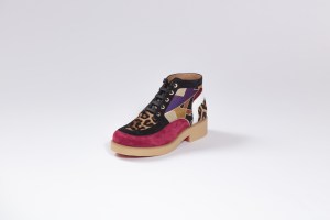For fall, Christian Louboutin reprised a craft technique derived from a 1999 archive mule called Trash. Hand-torn pieces of the label’s brown paper bags are collaged beneath a PVC overlay and employed for studded baseball boots, heeled Chelsea styles and a creeper.  Elsewhere there was an interiors-inspired story with patchwork applications and optic prints. Velvet slippers spelled out the word love in mismatched beading while a graffiti print came rendered in sequins on sneakers.