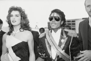Michael Jackson, center, nominated for 12 Grammys in 10 categories, arrives backstage with actress Brooke Shields, left, at the Shrine Auditorium for the 26th annual Grammy Awards presentation, Los Angeles, CalifMichael Jackson and Brooke Shields 1984, Los Angeles, USA