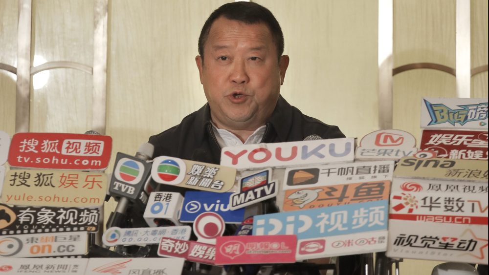 Hong Kong actor Eric Tsang speaks during a press conference to deny allegations of sexual harrassment.