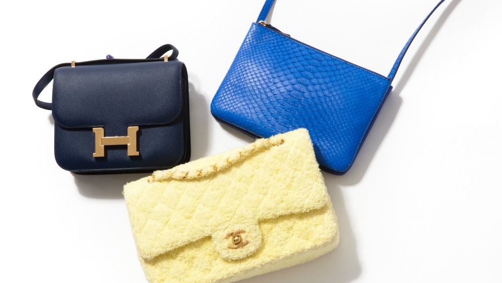 Assorted designer handbags.