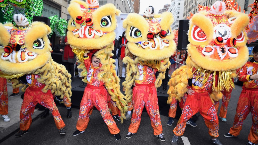 Members of the New York United Lion and Dragon Dance Troupe perform during Madison Street To Madison Avenue: A Lunar New Year Celebration on February 10, 2018 in New York City.