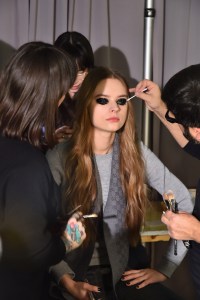 “It’s the easiest smoky eye that you can do,” said Erin Parsons, who keyed makeup for Maybelline. Makeup focused on a black, smoky eye, which was first created with the Maybelline Eyestudio Lasting Drama Waterproof Gel Pencil in sleek onyx. The eyeliner was applied on the crease, on the top and bottom of the eye and water line. Then a black glitter was coated onto the eyelids by using a finger application. Waterproof black mascara was also added to further the graphic look. — Layla Ilchi