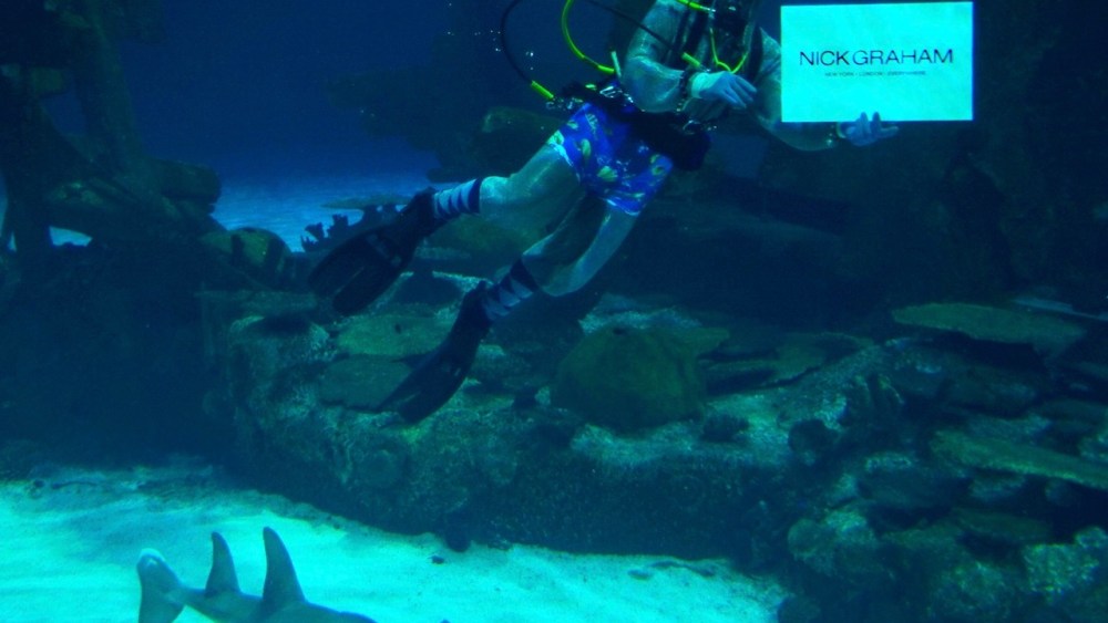 Nick Graham introduces his underwear collection in a shark tank in Las Vegas.