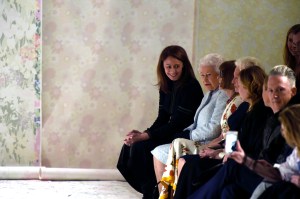 Queen Elizabeth sitting front row between Caroline Rush and Anna Wintour