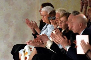 Queen Elizabeth sitting front row between Caroline Rush and Anna Wintour