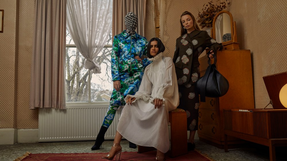 Richard Quinn, Nabil Nayal (sitting) and Emma Charles.