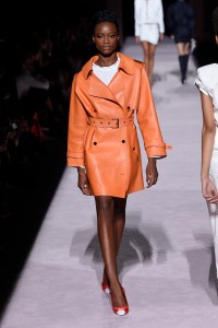 For Ford, chic daytime dressing is all about the "potent piece." Here, his Spring 2018 trench.