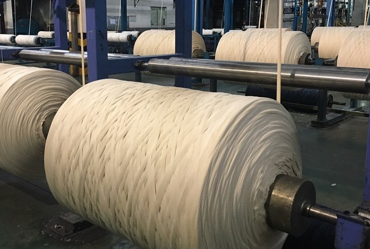 Carved Blue Heads East: Denim Mills Vietnam and China