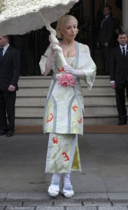 Lady Gaga leaving The Langham Hotel on Halloween, wearing a Japanese inspired Kimono outfit and a huge seashell umbrella. 31 Oct 2013 Pictured: Lady Gaga, Stefani Joanne Angelina Germanotta. Photo credit: Will / MEGA TheMegaAgency.com +1 888 505 6342 (Mega Agency TagID: MEGA675197_047.jpg) [Photo via Mega Agency]