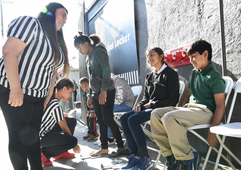 Foot Locker Gives Almost 5,000 L.. Kids New Shoes