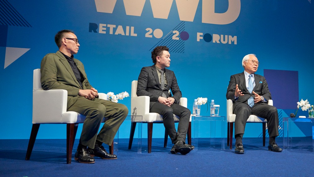 Yoshiaki Arai, Hiroyuki Kondo, and Susumu Sasaki speaking at WWD's inaugural Tokyo summit in partnership with Lumine.