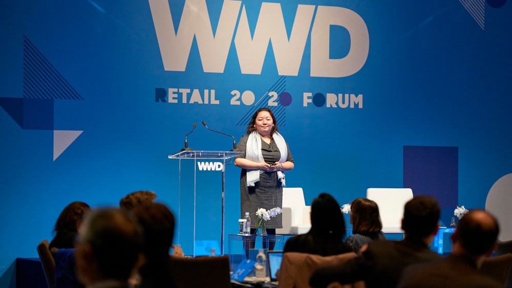 Naomi Yamakawa speaking at WWD's inaugural Tokyo summit in partnership with Lumine.