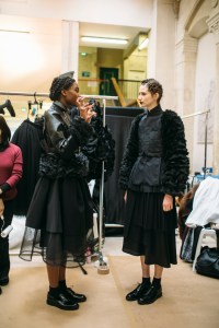 Backstage at Noir Kei Ninomiya RTW Fall 2018