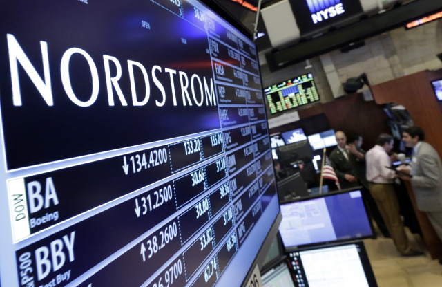 The Nordstrom logo is displayed above the post where it trades on the floor of the New York Stock Exchange, . Nordstrom slashed its annual projections and said a key measure of sales fell for the first time in almost seven yearsFinancial Markets Wall Street Nordstrom, New York, USA