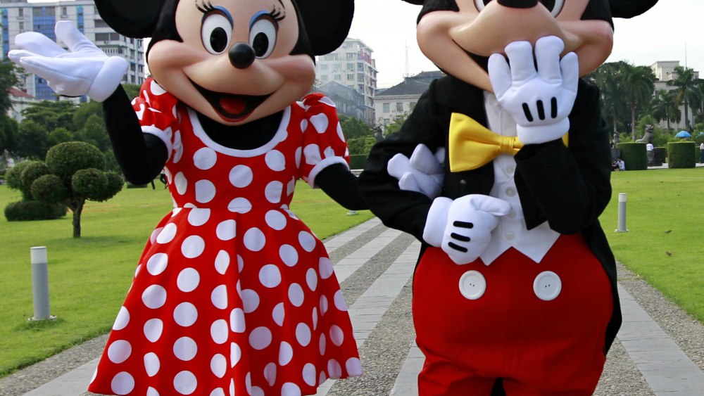 World Famous Disney Characters Mickey Mouse (l) and Minnie Mouse (r) Pose For Photos in Front of the Independence Monument in Yangon Myanmar 25 September 2014 the Walt Disney Characters Are on a Tour in Myanmar to Promote the 'Disney Live!' Presentation of Three Classic Fairy Tales Featuring More Than 25 Disney Characters Such As Snow White and the Seven Dwarfs Cinderella and Beauty and the Beast Planned at the Myanmar Event Park From 08 to 12 October 2014 Myanmar YangonDisney Characters in Myanmar - Sep 2014