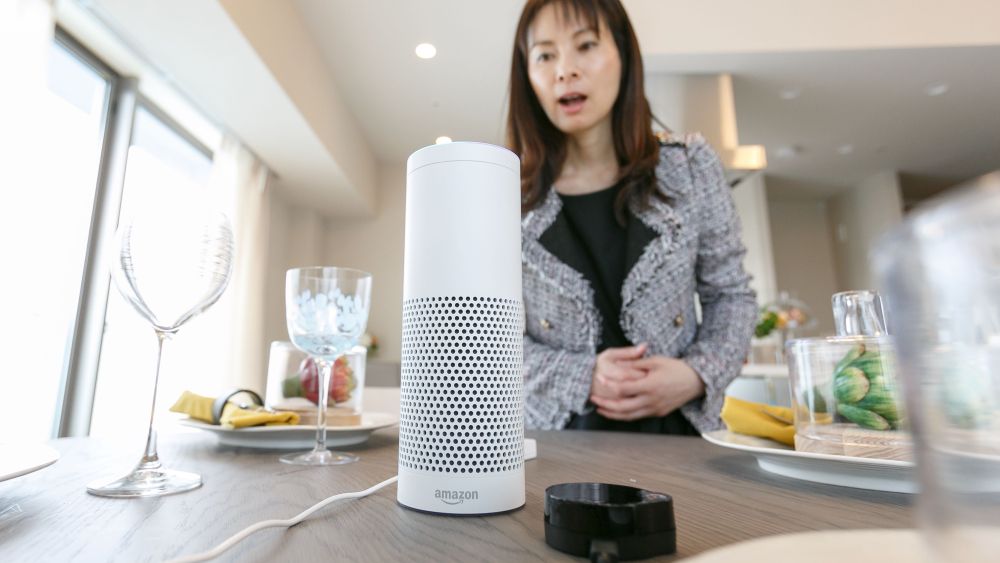 Amazon Echo Plus is a smart speaker programmed with Amazon's artificial intelligence assistant app called Alexa to control home appliances such as TV and lights through human voiceAmazon Echo Plus at MID Base Tower Residence, Yokohama, Japan - 22 Nov 2017