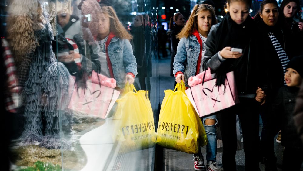 People carry shopping bags outside a shopping mall in New York, New York, USA, 20 December 2017.Holiday shopping in New York, USA - 20 Dec 2017