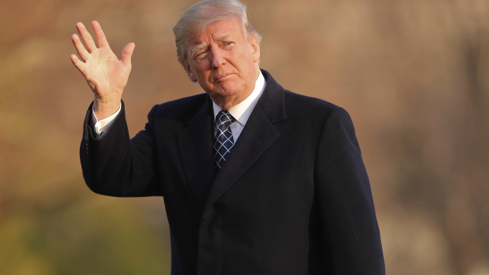 U.S. President Donald Trump waves as he walks across the South Lawn of the White House in Washington, after returning from his Mar-a-Lago estate in Palm Beach, FlaTrump, Washington, USA - 25 Mar 2018