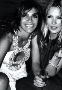 Carine Roitfeld in a Trois Anneaux Azzaro dress.
