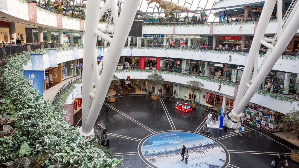 Men and women shop at Khan Shatyr Mall in Astana, Kazakhstan.