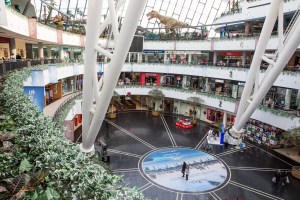 Men and women shop at Khan Shatyr Mall in Astana, Kazakhstan.