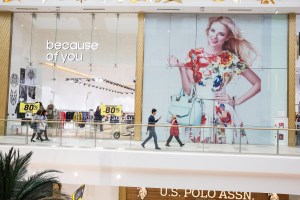 Men and women shop at the Mega Silkway mall in Astana, Kazakhstan.