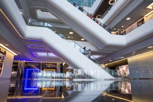 Men and women shop at the Esentai Mall in Almaty, Kazakhstan.