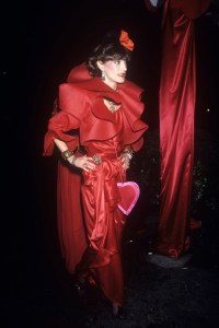 Loulou de la Falaise t Nelson Seabra's Red Ball, to celebrate his 60th birthday, at which female guests were asked to wear red,1980