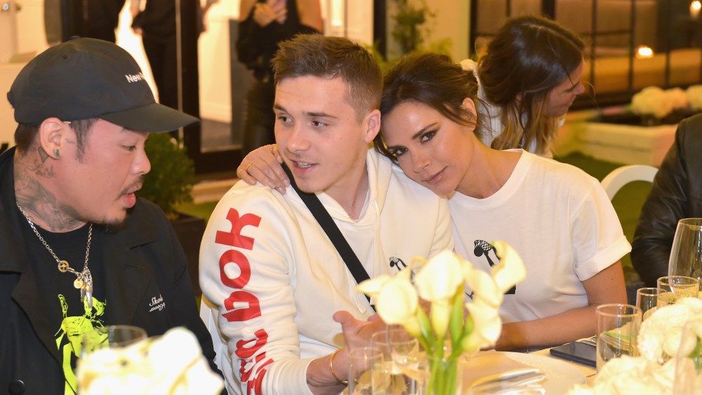 Brooklyn Beckham and Victoria Beckham an event celebrating Reebok and Victoria Beckham celebrate their partnership. Special guest Shaquille O'Neal officially welcomes Victoria to the Reebok Team at The House on Sunset on April 12, 2018 in Beverly Hills, California. (Photo by Donato Sardella/Getty Images for Reebok) *** Local Caption *** Dr. Woo, Brooklyn Beckham;Victoria Beckham