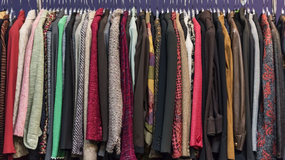 Women's jacket selection in a thrift shop.Various America