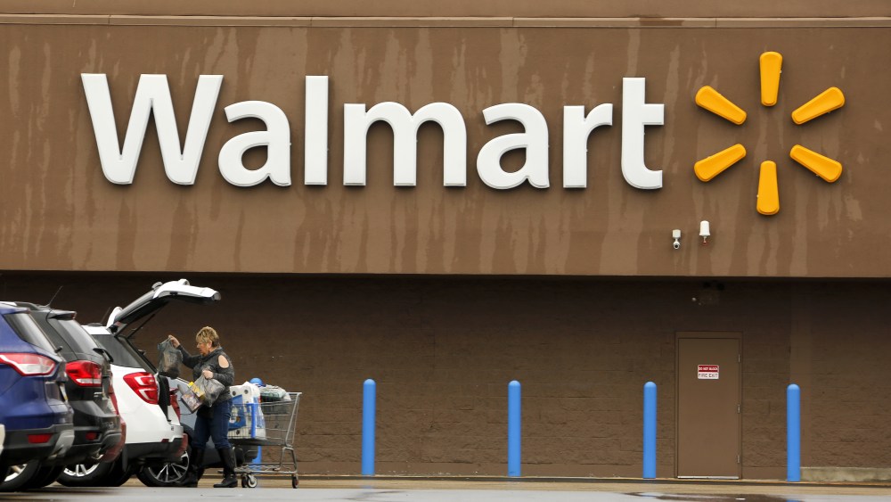 A shopper loads her car after shopping at a Walmart in PittsburghWalmart, Pittsburgh, USA - 22 Feb 2018