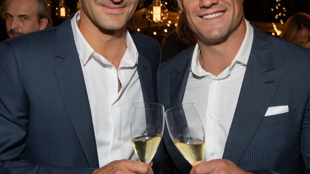 Roger Federer with Dan Carter