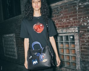 A look from the Disney x Coach: A Dark Fairy Tale collection.