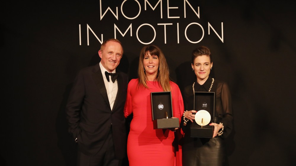 CANNES, FRANCE - MAY 13:  Francois-Henry Pinault, Patty Jenkins and Carla Simon pose with the Women in Motion Award at Place de la Castre on May 13, 2018 in Cannes, France.  (Photo by Vittorio Zunino Celotto/Getty Images)
