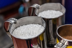 Silver sits in containers.