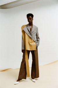 Gabriele Colangelo’s wool and leather blazer and Strateas.Carlucci’s wool pants. Jennifer Fisher earrings and Tibi shoes.