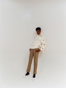 A.W.A.K.E.’s cotton and elastane top and Snow Xue Gao’s wool pants. Gaviria earring, Lady Grey ring, Wolford tights and Tibi shoes.
